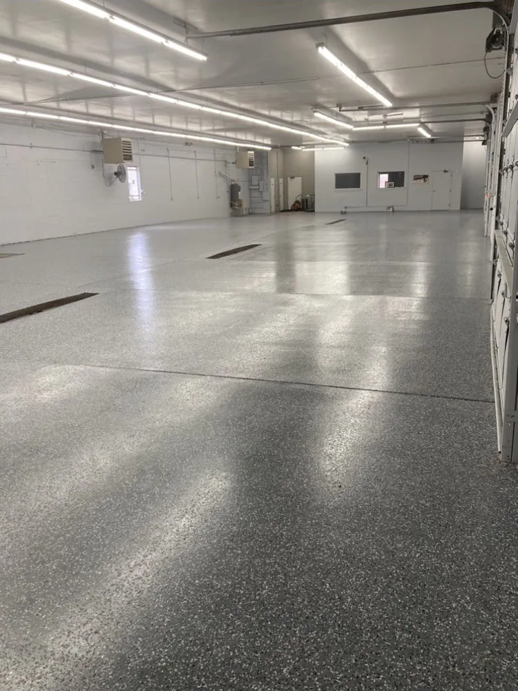 Flake epoxy floor in a large commercial bay