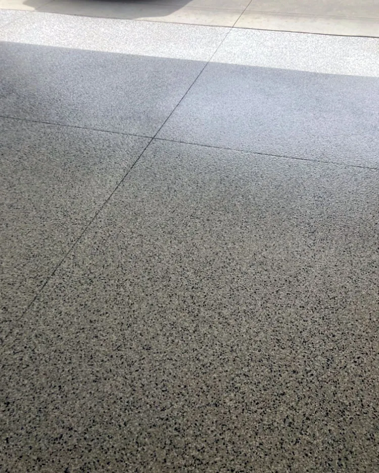 Gray flake epoxy garage floor with control joints