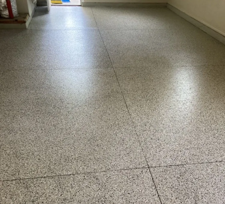 Flake epoxy garage floor with the door open