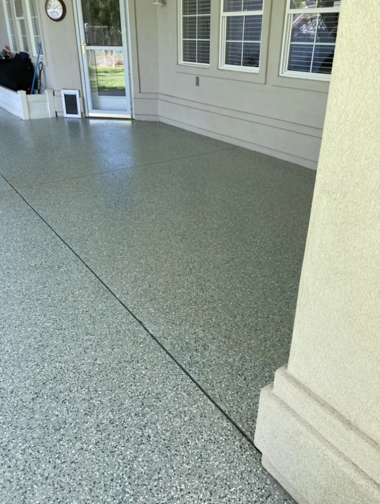 Flake epoxy floor by french doors
