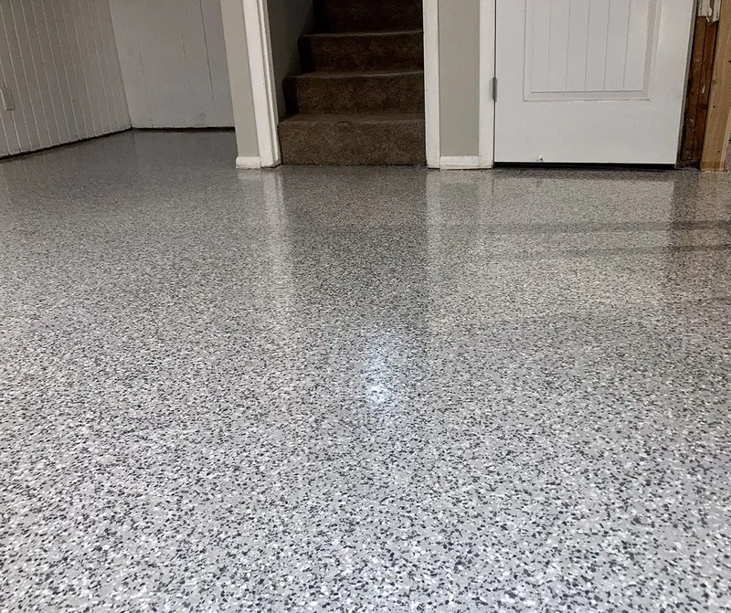 Flake epoxy garage floor at the stairs
