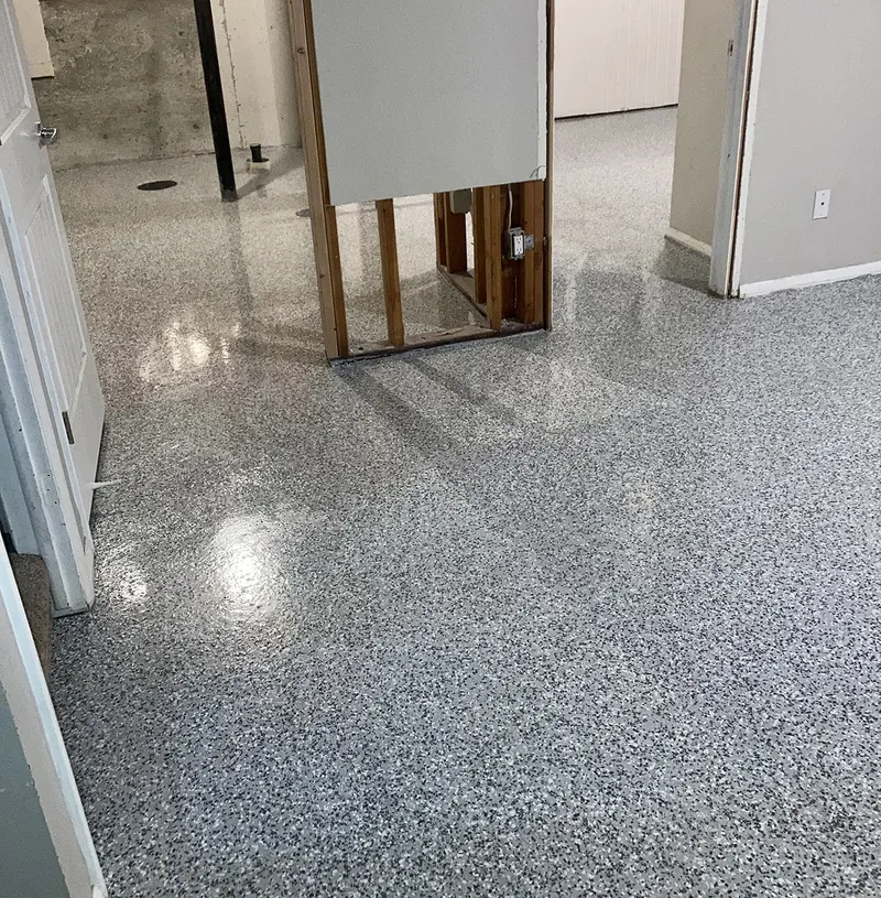 Flake epoxy floor in a garage under renovation