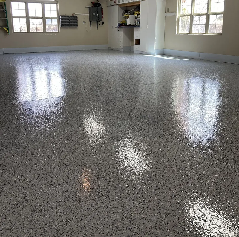 Glossy flake epoxy garage floor with windows