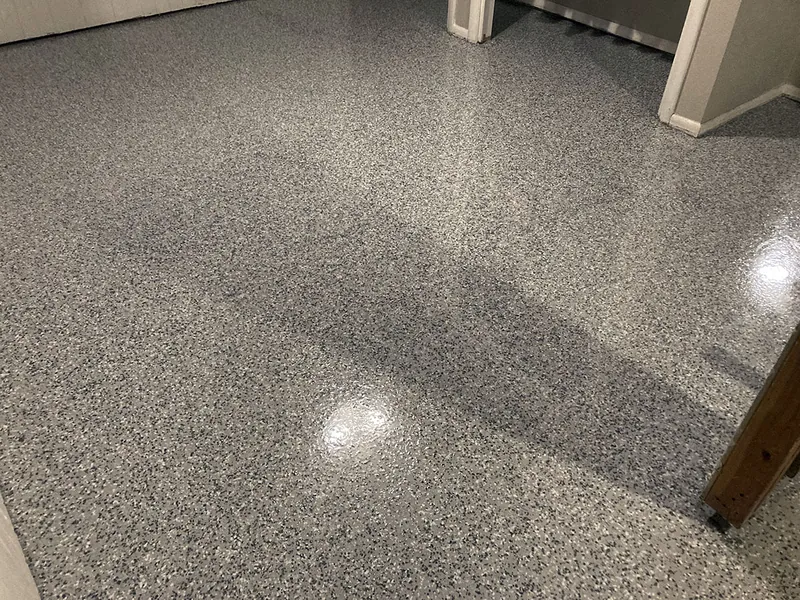 Flake epoxy garage floor with door open