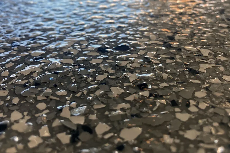 Macro view of black, gray and white flake blend