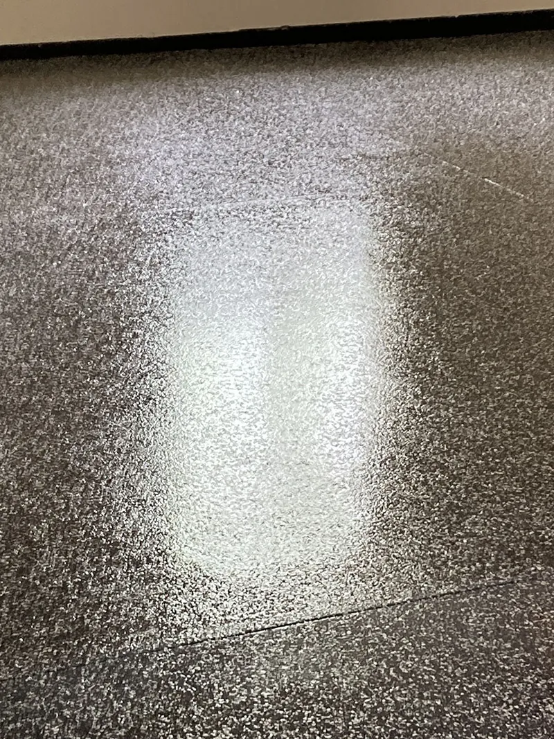 Close-up of dark flake epoxy floor