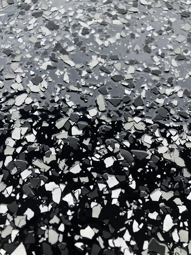 Macro view of black, white and gray flake chips