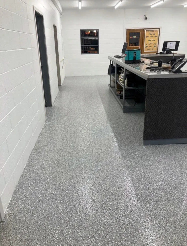 Flake epoxy floor in a commercial shop front