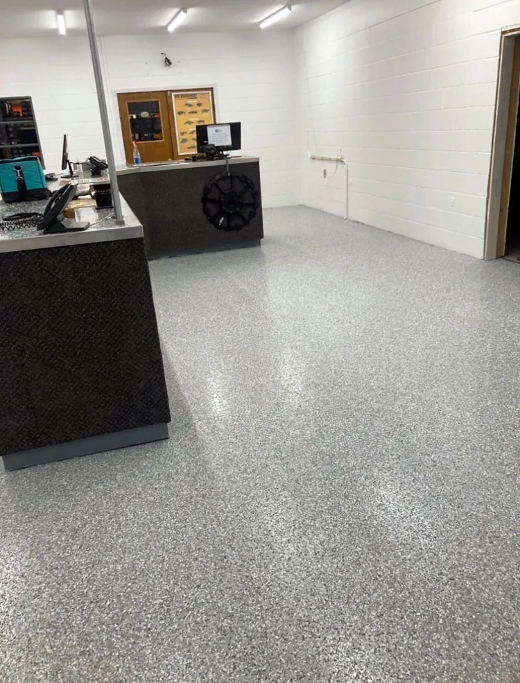 Flake epoxy floor in a commercial shop with service counter