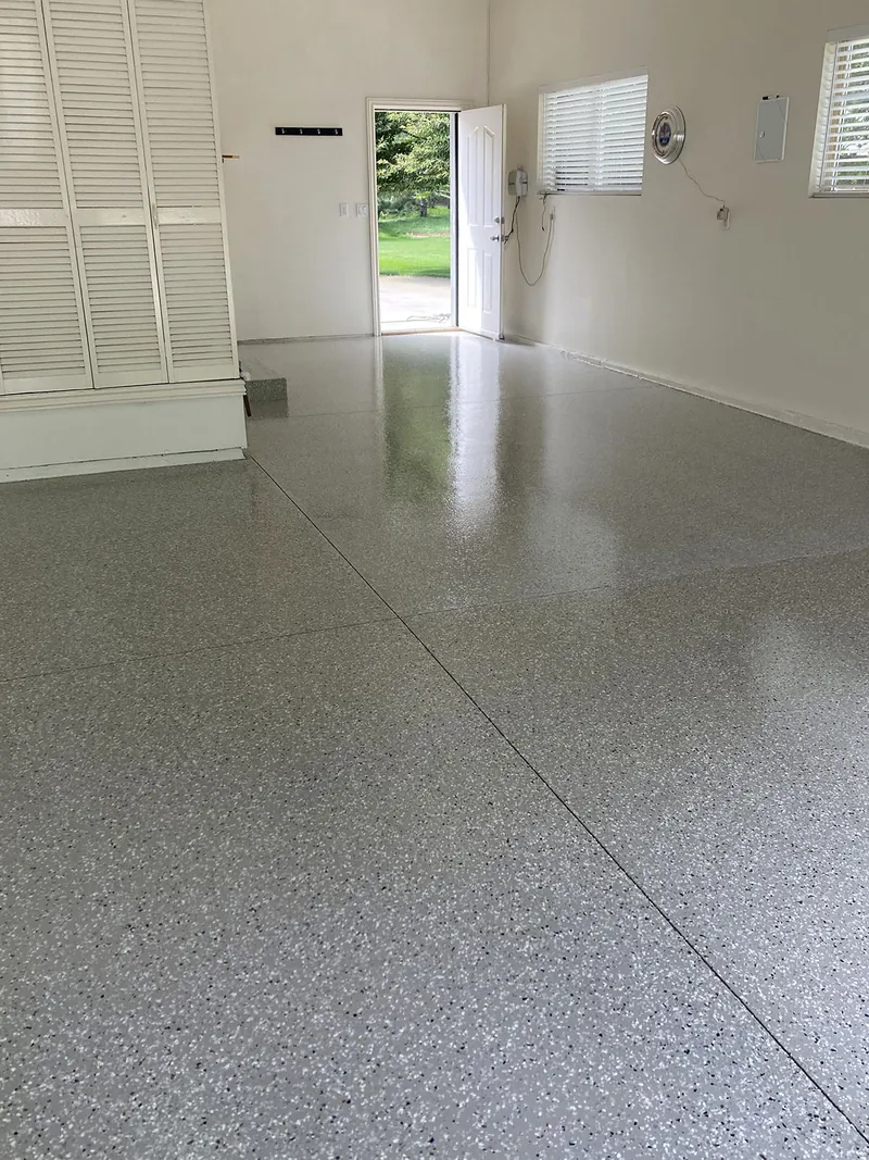 Light flake epoxy floor in a residential garage