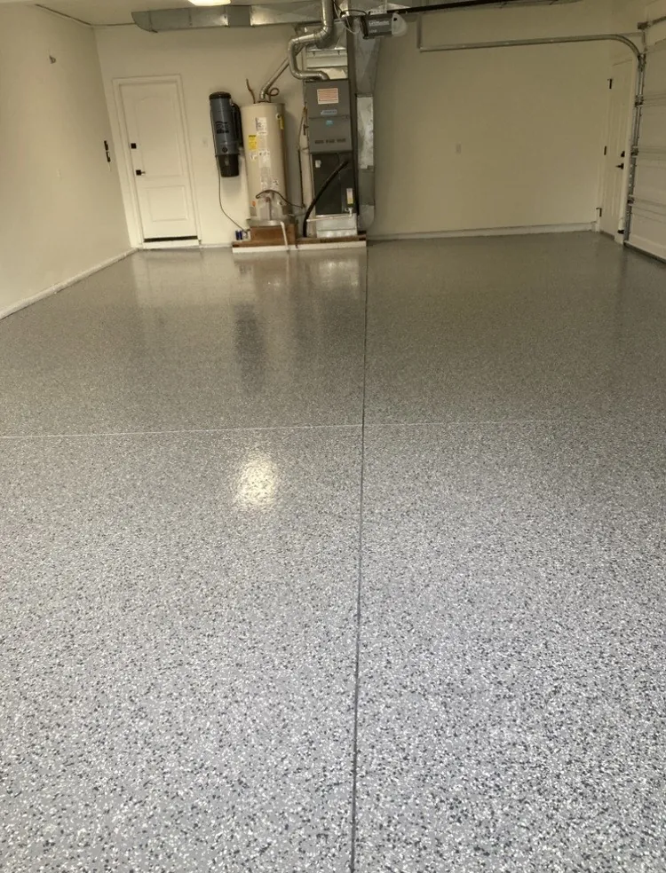 Flake epoxy garage floor around a water heater and furnace