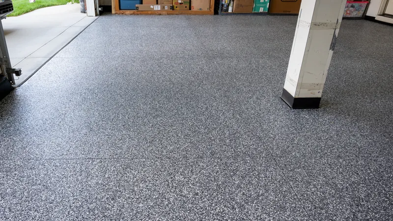 Flake epoxy floor in a commercial shop bay